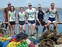 Triathletes flex their muscles in dock trash-athon