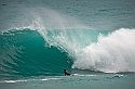 Surfers revel in rough seas