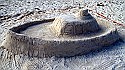 Tourists tell of tug of sandcastle contest