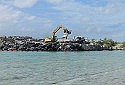 Alarm raised as crushed cars continue to spill into the sea