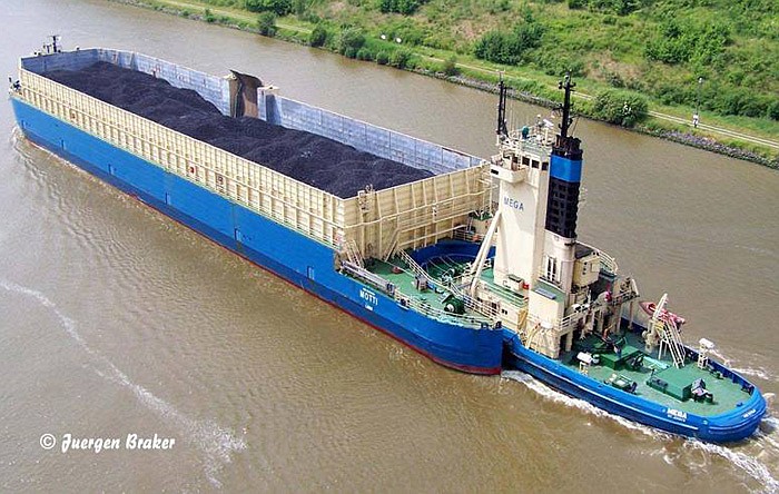 Mega ship pushes into port