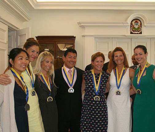 Boston Marathon runners given finisher's medals