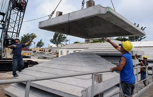 Low cost homes for Dockyard arrive via Virginia