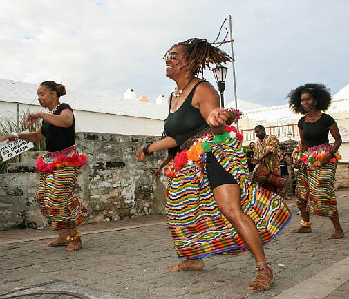 Visitors enjoy a sun-filled Art Walk in the East