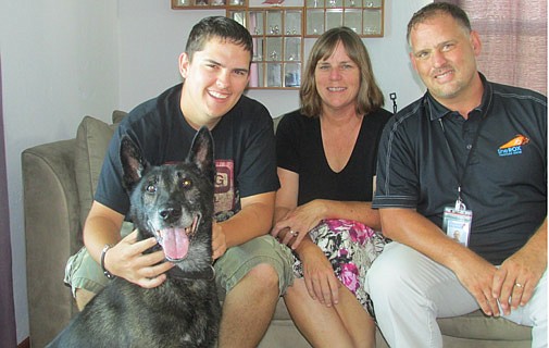 Retired police K9 laps up home comforts