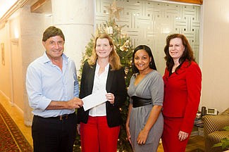 Three charities receive cheques from Marsh