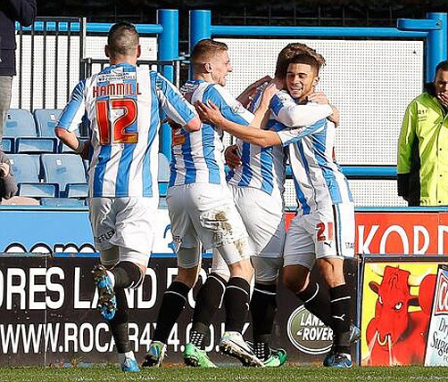 Wells leaves to standing ovation as Huddersfield Town routs Barnsley