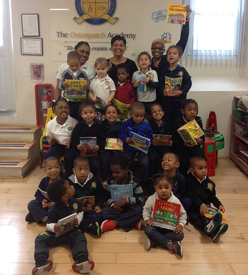 RenRe staff read to Onionpatch Academy students