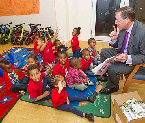 Minister Dunkley helps out book drive for local students