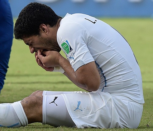 Suarez given four-month ban