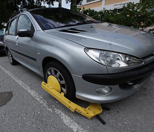 City at odds with judge over wheel clamping